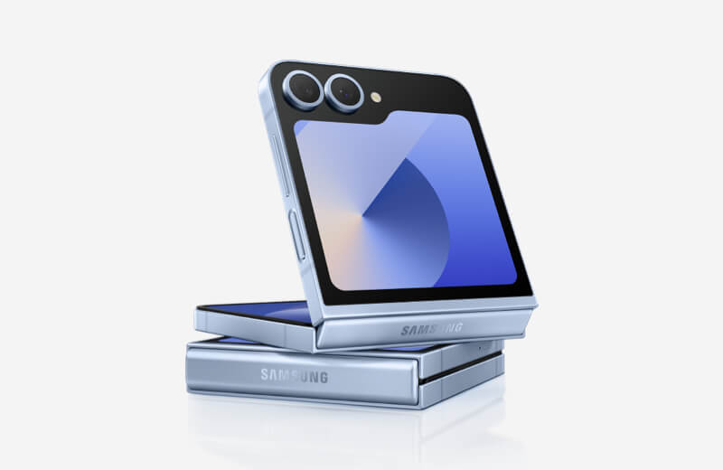 Young people crowded around a laptop